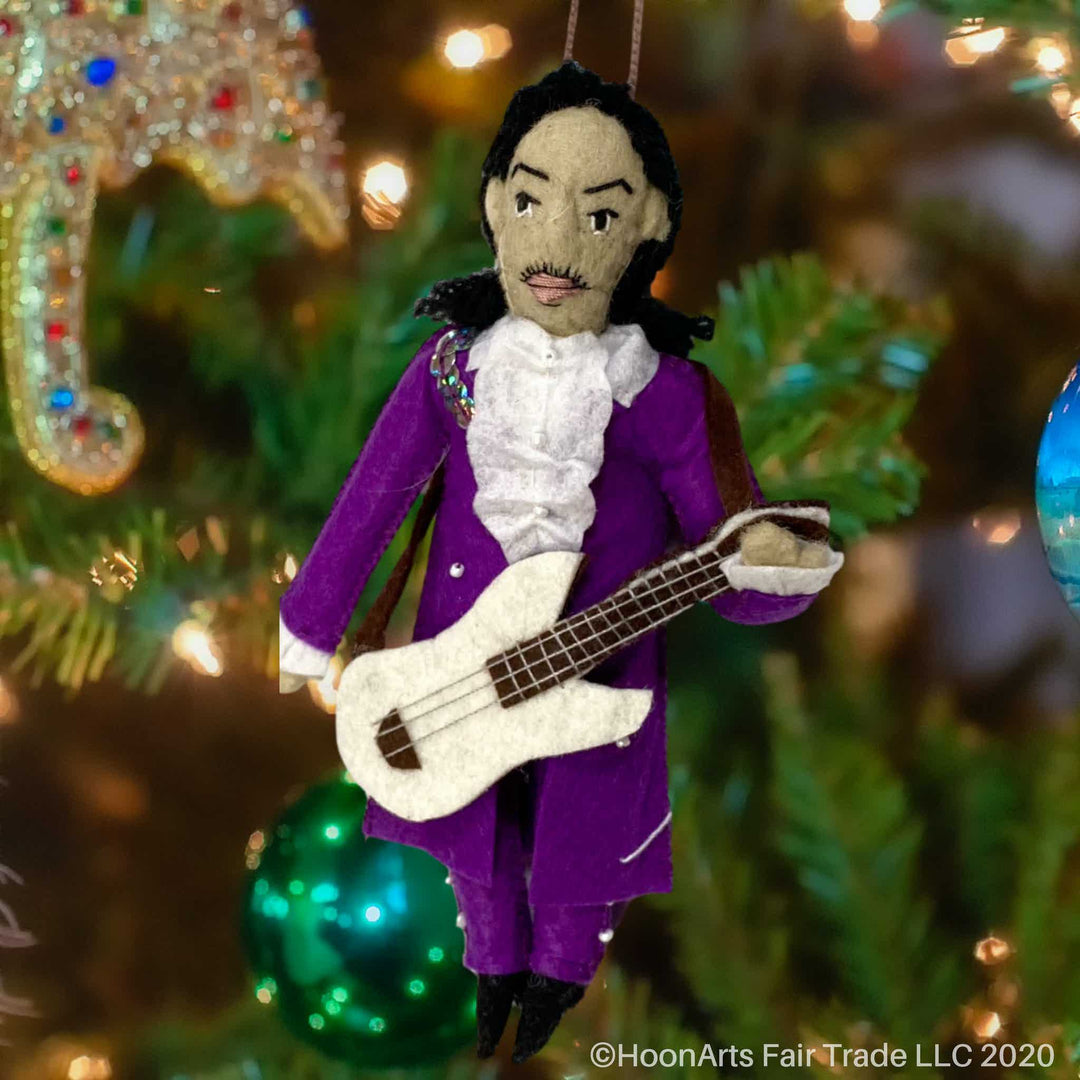 Felt Christmas Ornament-Prince Musician, in purple with guitar, hanging from a brightly decorated Christmas tree